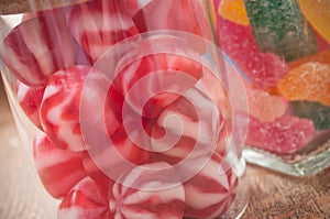 traditional red and white candies in glass container