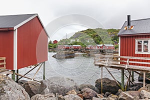 Traditional red wooden houses, rorbuer in the small fishing village of Nusfjord, Lofoten islands, Norway