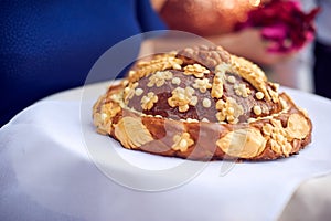 A traditional ritual of offering bread and salt to a welcome guest.