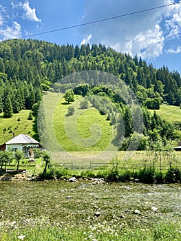 Traditional romanian Carpathian mountain view in Satic, Rucar, Arges, Romania