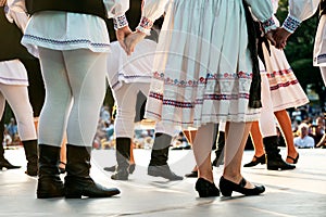 Traditional romanian dancers in traditional costumes