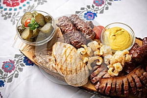 Traditional Romanian food. Close up view of a food plate made of pork meat