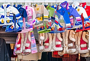 Traditional romanian hand made clothes for children on display at the weekly fair market near Bran Castle, Romania