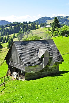 Traditional romanian rural barn Fundata photo