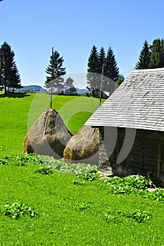 Traditional romanian village with straw bales