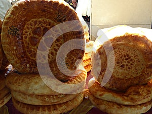 Traditional round flat breads of Uzbekistan. photo