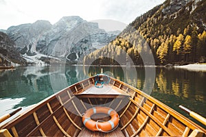 Traditional rowing boat at Lago di Braies in the Dolomites