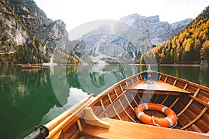 Traditional rowing boat at Lago di Braies in the Dolomites