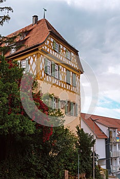 Traditional Rural House With Beautiful Exterior Facade Decor In Germany. German Old Construction House. Ancient European