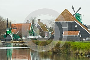 Traditional rural settlement in old Holland with old windmills and river