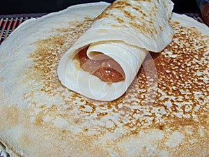 Traditional russian blini with apple jam. Pancakes. Pancake week. Maslenitsa is an Eastern Slavic traditional holiday