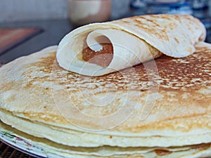 Traditional russian blini with apple jam. Pancakes. Pancake week. Maslenitsa is an Eastern Slavic traditional holiday