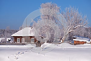Traditional russian country house izba in village Talitsa under