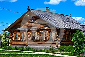 Traditional russian house named izba. photo