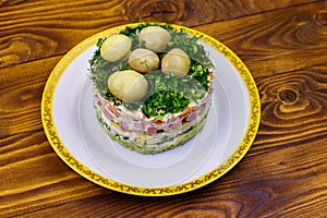 Traditional Russian layered salad `Mushroom Glade`