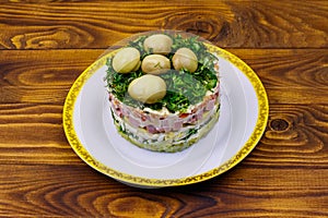 Traditional Russian layered salad `Mushroom Glade`