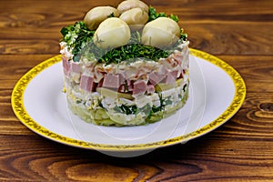 Traditional Russian layered salad `Mushroom Glade`