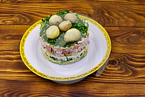 Traditional Russian layered salad `Mushroom Glade`