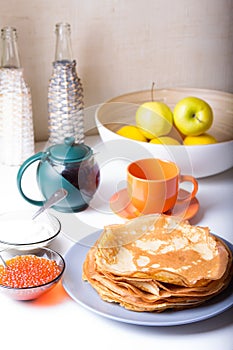 Traditional Russian pancakes with caviar and sour cream. Shrovetide