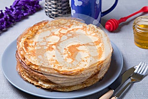 Traditional Russian pancakes with honey. Shrovetide.