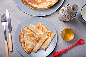 Traditional Russian pancakes with honey. Shrovetide.