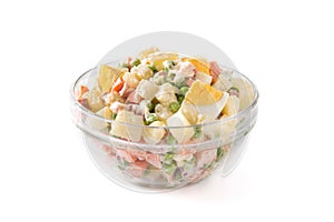 Traditional Russian salad in bowl. Olivier salad isolated