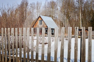 Traditional Russian village with an old house in spring