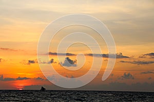 Traditional sailing boats on a sunset tour