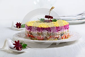 Traditional salad with herring and vegetables