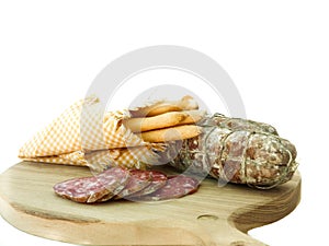 Traditional salami with bread-sticks