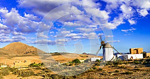 Traditional scenery of volcanic Fuerteventura. windmills and small villages. Canary islands