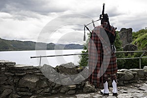 Traditional scottish bag piper