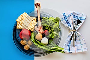 Traditional Seder Plate with symbolic foods on blue and white surface.