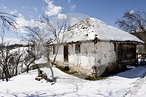 Traditional Serbian farm house in winter
