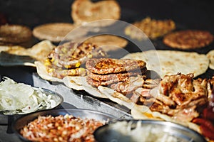 Traditional serbian street food burger or pljeskavica, flatbread and meat photo