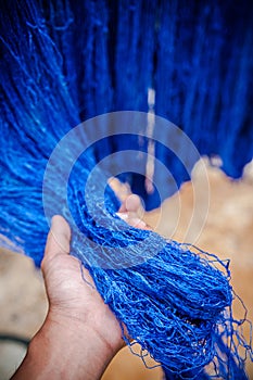 Traditional sericulture Thai silk thread in hand