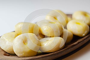 Traditional Silesian dumplings with a hole,  homemade noodles served with butter