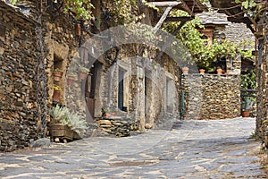 Traditional slate stone village Roblelacasa. Black architecture. Guadalajara. Spain photo