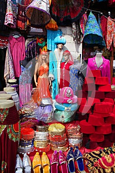 Traditional slippers, fez and caftan photo