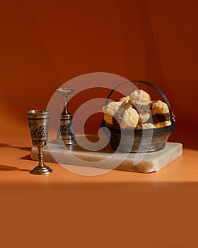 Traditional Slovak dessert Laskonky. Delicate meringue with whipped cream and chopped walnuts. Modern still life with hard shadows