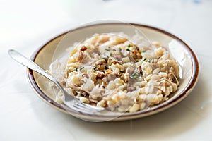 Traditional Slovak dish Halusky - Strapacky with sauerkraut on a plate