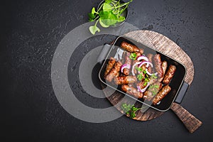 Traditional south european skinless sausages cevapcici made of ground meat and spices