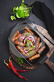 Traditional south european skinless sausages cevapcici made of ground meat and spices