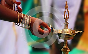 Traditional south indian brass oil lamp 'Nilavilakku '. During events like housewarming, marriage etc., the Nilavilakku is light