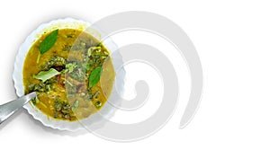 Traditional south indian snack dal sambhar soup with curry leaves