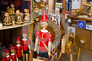 Wood traditional souvenir Pinocchio puppets from Italy