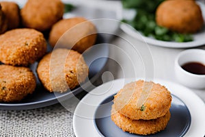 Traditional Spanish Croquetas with Delicious Sauce on White Plate