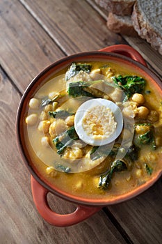 Traditional Spanish cuisine dish that is eaten mainly during the Holy Week holidays. Chickpea, cod, spinach and egg soup. Vigil Po