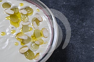 Traditional Spanish dish, cold soup ajo blanco or ajoblanco from garlic, almonds, white wine vinegar, olive oil and grapes