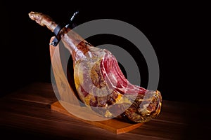 Traditional spanish jamon serrano, italian parma, hamon iberico, prosciutto, leg photo